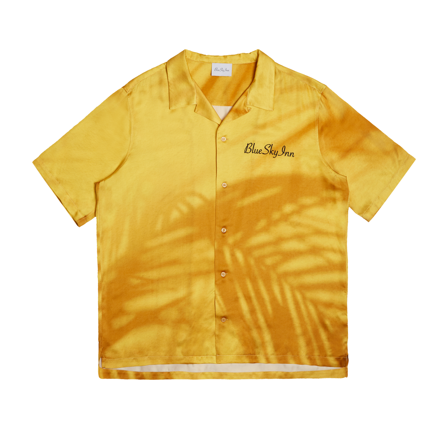 Camisa con sombra dorada