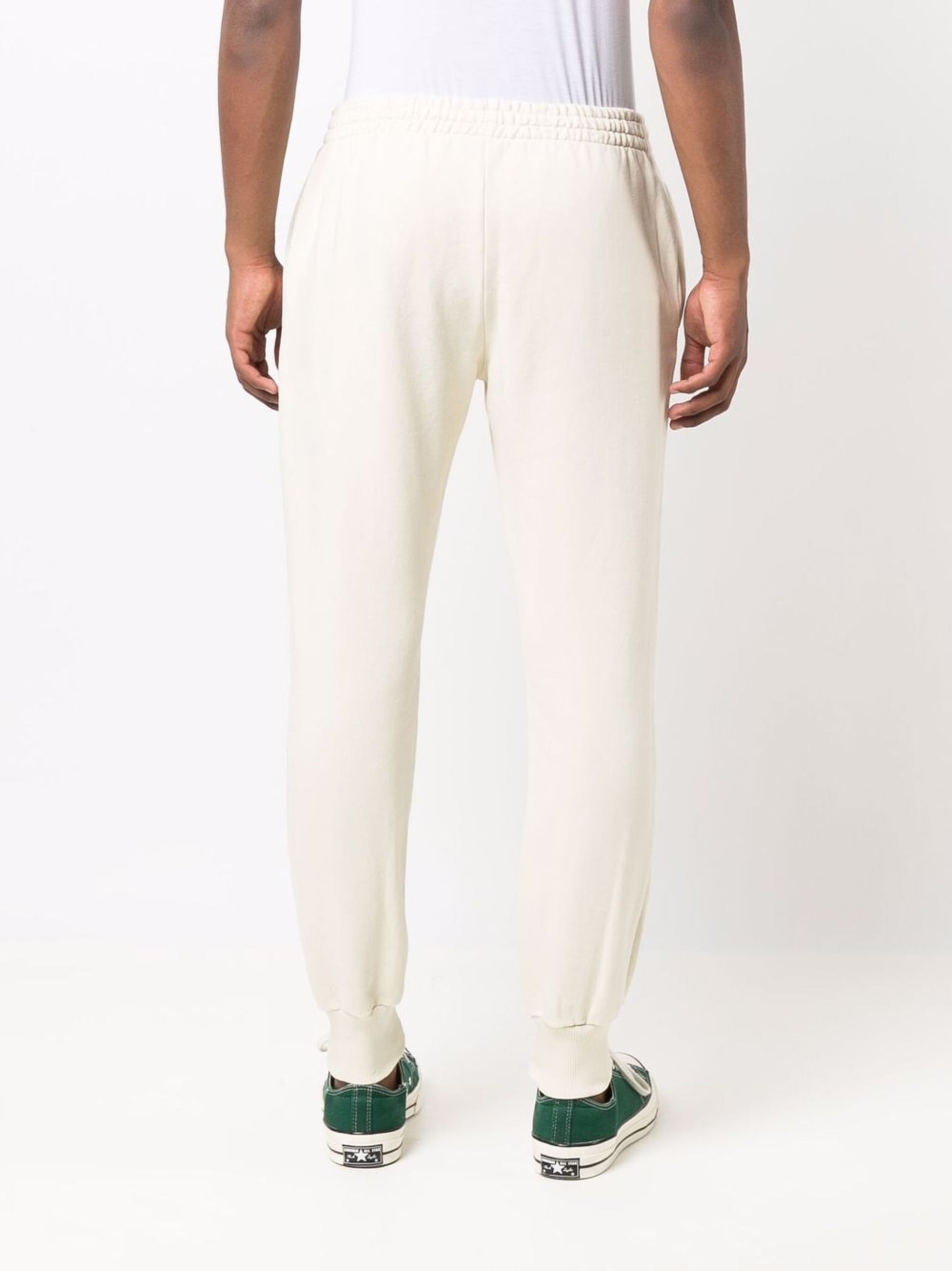Pantalones deportivos con logotipo en color crema