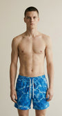 Close-up of the model wearing Swim Trunks