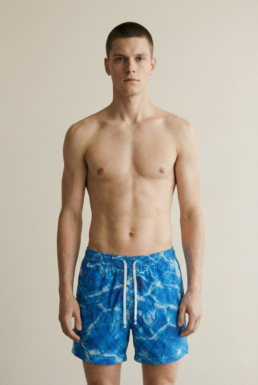 Close-up of the model wearing Swim Trunks