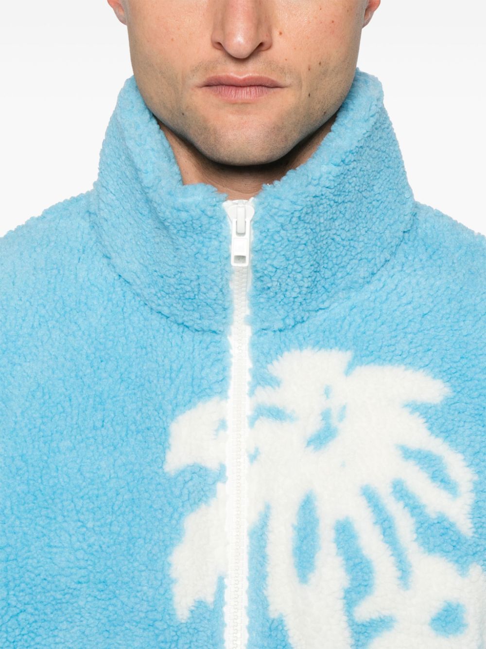 Chaqueta polar azul bebé