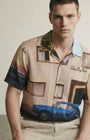 Close-up of the model wearing Blue Car Shirt