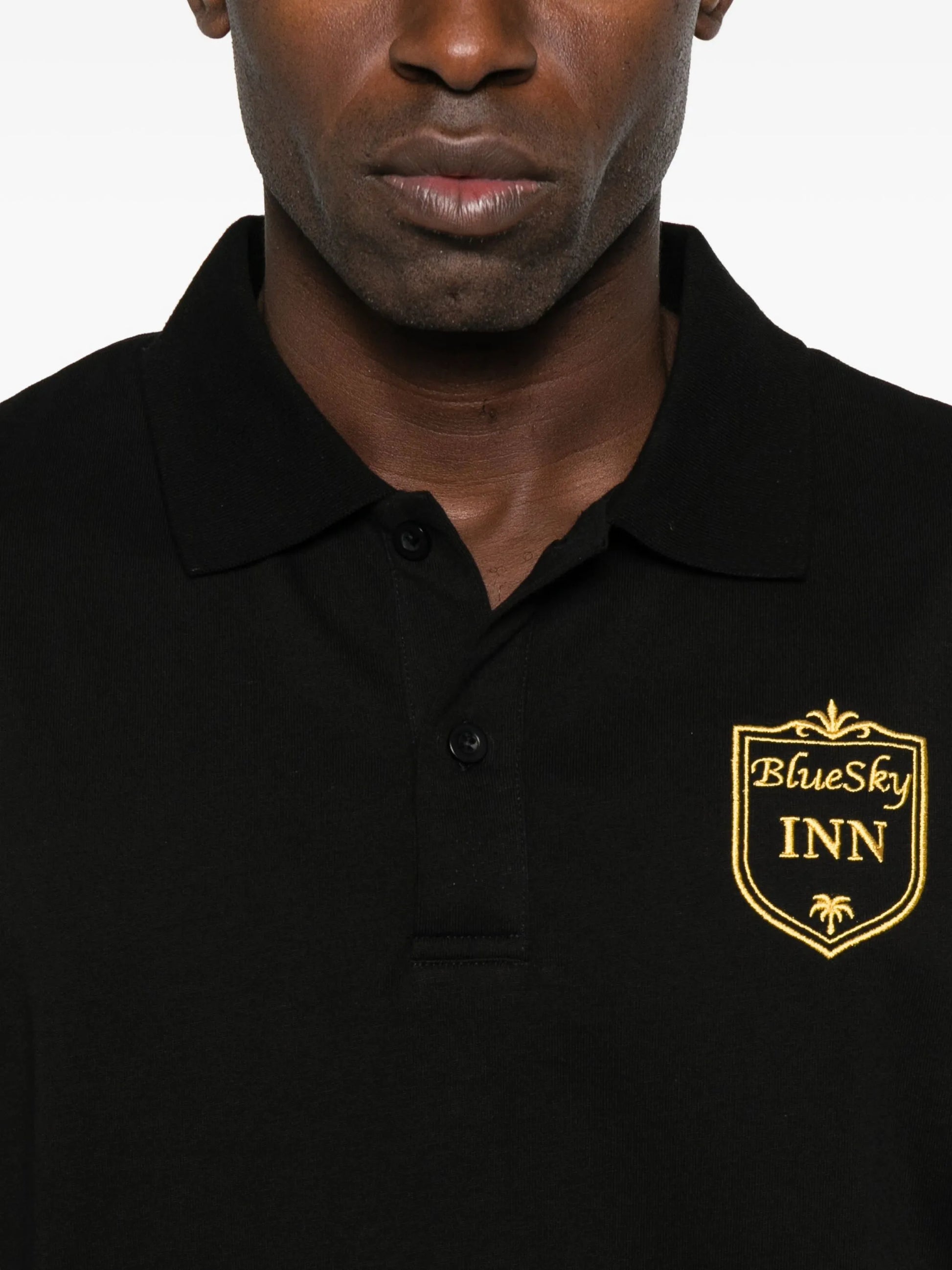 Black Polo Shirt with Gold Embroidered Logo