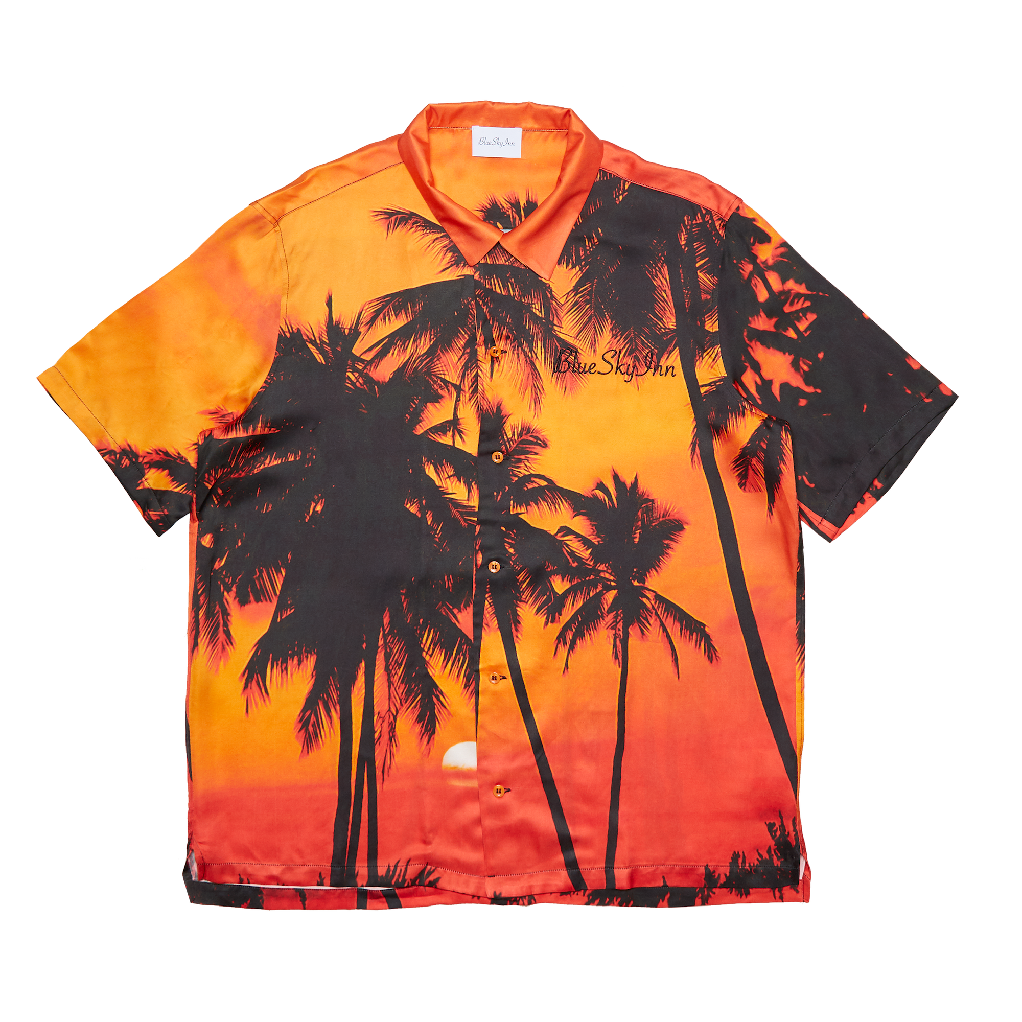 Camiseta con palmeras al atardecer