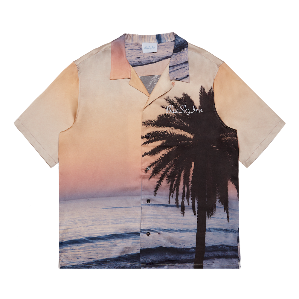 Camiseta con palmeras al atardecer
