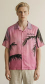 Close-up of the model wearing Pink Palms Shirt