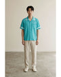 Full body view of the model wearing Turquoise Waiter Shirt