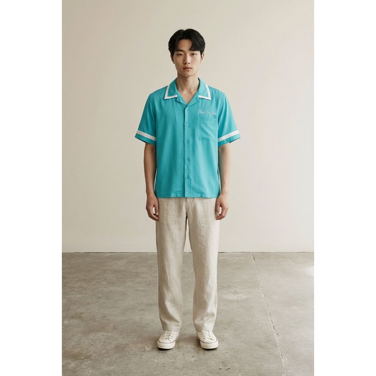 Full body view of the model wearing Turquoise Waiter Shirt