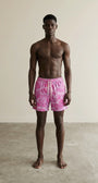 Full body view of the model wearing Swim Trunks