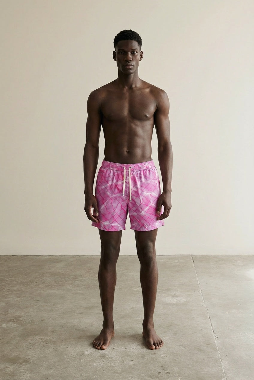 Full body view of the model wearing Swim Trunks