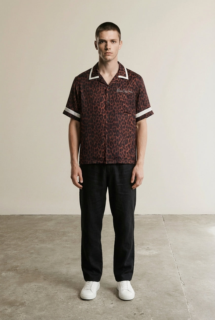 Full body view of the model wearing Leopard Waiter Shirt