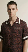 Close-up of the model wearing Leopard Waiter Shirt