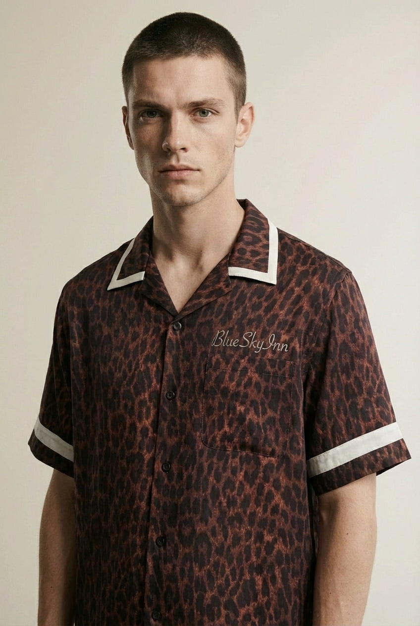 Close-up of the model wearing Leopard Waiter Shirt